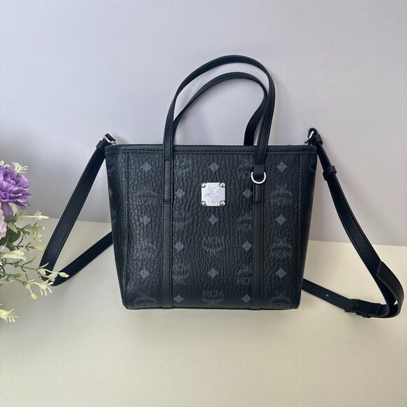 MCM Handbags - MCM black printed handbag crossbody bag